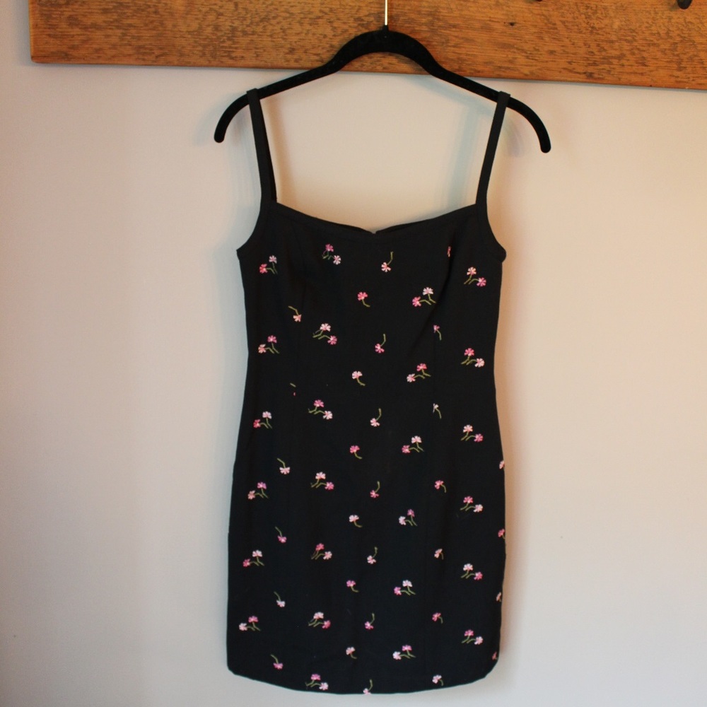 Black dress with pink embroidered flowers
